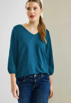 Bluse Mit Smokdetails