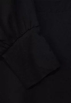 Langarmshirt Im Materialmix